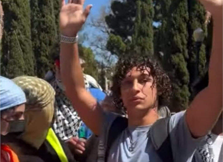 UCLA student Eli Tsives is blocked by pro-Palestinian militants from entering campus, one of many harassment incidents suffered by Jewish students at American universities in recent months. So far, both campus and federal authorities have failed to punish offenders